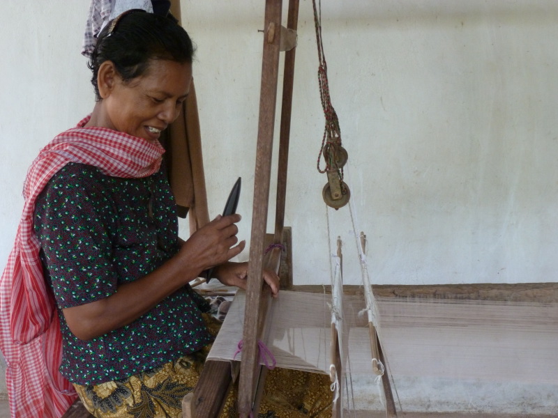 The mother of Someang is weaving a silk scarf