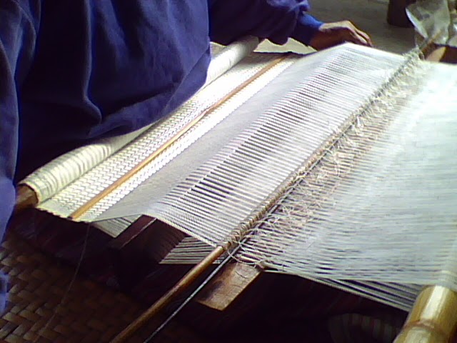 Boonmuang - working behind a loom